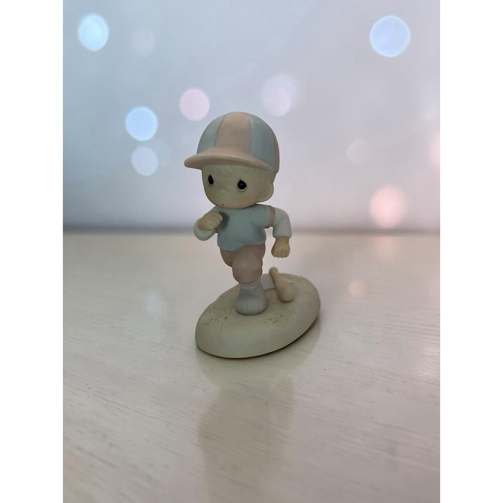 Porcelain figurine titled 'Lord, I'm Coming Home' by Precious Moments 1985